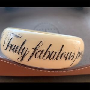 Jessica Cushman ivory bangle, with inscription.